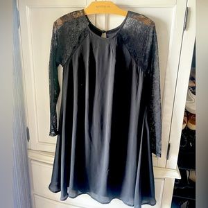 Black mini dress with lace sleeves